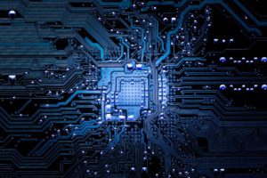 A close up of the circuit board of an electronic device.